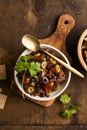 Olive tapenade with herbs and olive oil in a rustic bowl Royalty Free Stock Photo