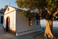 Olive tree and the church of Agios Ioannis Kastri at sunset, famous from Mamma Mia movie scenes, Skopelos Island