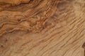 Olive wood texture background. Vintage wood. Surface of texture with natural pattern. Close up cross section of tree texture Royalty Free Stock Photo