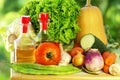 Oliveoil,vinegar, and vegetables Royalty Free Stock Photo