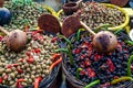 Olives In baskets with wooden spoons at a French market. Royalty Free Stock Photo