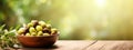 Olives in a bowl against the backdrop of the garden. Selective focus. Royalty Free Stock Photo