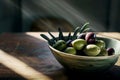 Olives in the bowl on wooden table. healthy food concept. AI generative Royalty Free Stock Photo