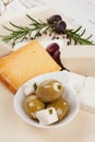 Olives and cheese background. Royalty Free Stock Photo