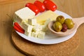 Olives, cheese and tomatos on a plate Royalty Free Stock Photo