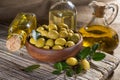 Olives close-up and a bottle of olive oil Royalty Free Stock Photo