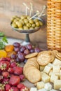 Olives and fruits on a beautifully vintage decorated table Royalty Free Stock Photo