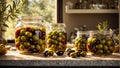 Olives a glass jar in the kitchen appetizer healthy