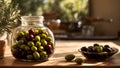 Olives a glass jar in the kitchen appetizer