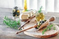 Olives are green and black with soft cheese with mold like brie, Camembert with olive oil and thyme. Cheese and olives in an olive Royalty Free Stock Photo
