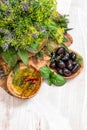 Olives, oil, basil, dill, sage. Herbs and spices. Healthy food Royalty Free Stock Photo