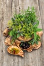 Olives, oil, basil, dill, sage, lavender, mint. Herbs and spices Royalty Free Stock Photo