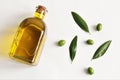 Olives oil bottle with green olive and leave Royalty Free Stock Photo