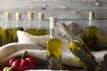 Olives and olive oil in mini bottle on wood Royalty Free Stock Photo