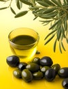 Olives and olive oil and olive leaves floating on a green background Royalty Free Stock Photo