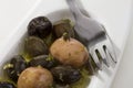 Olives, spice, oil and fork Royalty Free Stock Photo