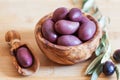 Olives on wooden background, kalamata, kalamon, green olives