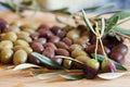 Olives on wooden background, kalamata, kalamon, green olives