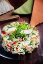 Olivier Salad or Russian Salad with Salmon and Red Caviar Royalty Free Stock Photo