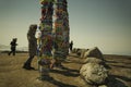 Sacred serge pillars near Shamanka, Cape Burkhan. Colorful Tibetan Buddhist ribbons