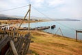 Olkhon Island, Lake Baikal in summer. A broken, leaning wooden fence in the village of Khuzhir