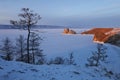 Olkhon island. Shamanka rock. Sunset landscape.Baikal Lake, winter Royalty Free Stock Photo