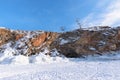 Olkhon island winter landscape. View of the mountains and frozen Lake Baikal on a clear day Royalty Free Stock Photo