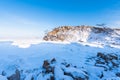 Olkhon island winter landscape. View of the mountains and frozen Lake Baikal on a clear day Royalty Free Stock Photo