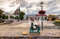 Panoramic view of Olkusz market square with St. Andrew Basilica and statue of historic Miners in Beskidy mountain region of Poland