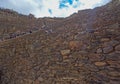 Ollantaytambo/Peru - Oct.02.19: tourists climbing the stairs of archaeological park, on the Sacred valley of incas