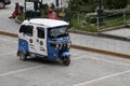 Traditional TukTuk Taxi in the town square. Ollantaytambo, Peru, October 5, 2023.