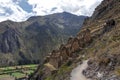 Ollantaytambo ruins, a massive Inca fortress with large stone terraces on a hillside, tourist destination in Peru Royalty Free Stock Photo