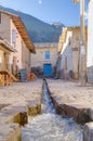 Ollantaytambo, Urubamba/Peru - circa June 2015: Museum and stream at the street of Ollantaytambo Inca town, Peru Royalty Free Stock Photo