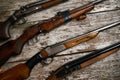 ollection of hunting rifles