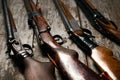 ollection of hunting rifles