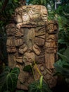 Olmec sculpture carved from stone. Mayan symbol - Big stone head statue in a jungle Royalty Free Stock Photo
