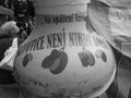 Retro image - Close-up view on a giant plum brandy bottle with funny writing at Flora Exposition at local market