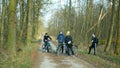 OLOMOUC, CZECH REPUBLIC, MARCH 19, 2020: Children girls boys group on trip bikes wood nature violate Government law