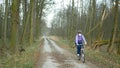 OLOMOUC, CZECH REPUBLIC, MARCH 13, 2020: Face masks coronavirus risk covid-19 family children on bike trip on bikes