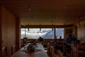 Olpererhutte, Austria - Aug 7, 2020: Snow mountain view from window of hostel restaurant