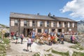 Olpererhutte, Austria - Aug 7, 2020: Tourists have food at wooden restaurant hostel