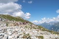 Olpererhutte, Austria - Aug 7, 2020: Tourists queue for swing bridge in summer afternoon