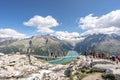 Olpererhutte, Austria - Aug 7, 2020: Tourists take photo on swing bridge with amazing view