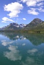 Olson Mountain and Citadel Peaks reflecting on Upper Waterton Lake at Glacier National Park