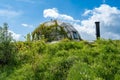 An ecological, sustainable house with dome shaped green roof in dutch town Olst