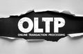 OLTP Online Transaction Processing abbreviation displayed in rugged torn paper background. IT and database system acronym Royalty Free Stock Photo
