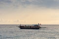 Oludeniz, Turkey - July 17, 2019. Pirate ship sailing in the Mediterranean. People rest on the ship. Overcast