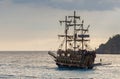 Oludeniz, Turkey - July 17, 2019. Pirate ship sailing in the Mediterranean. People rest on the ship. Overcast