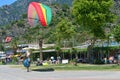 Oludeniz, Turkey - May 23, 2019: Paragliding in Oludeniz. Paraglider packs a parachute.