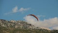 Paragliders flying aboce Oludeniz beach against mountain on background